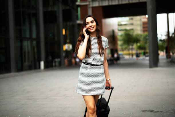 istock Young woman going to business trip 1441729249