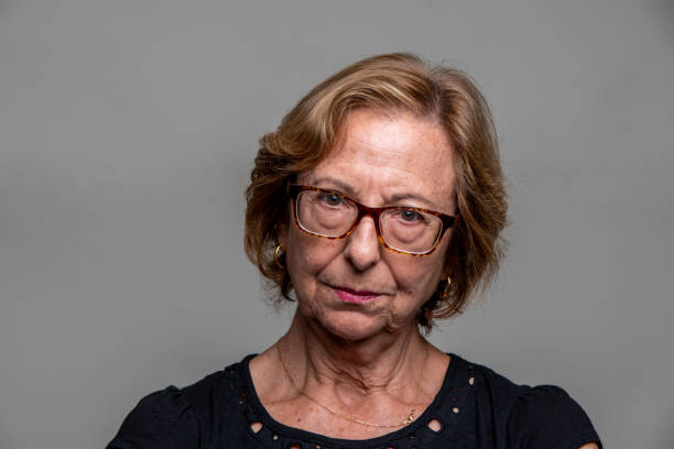 istock Serious Senior Woman front mugshot 1441731479