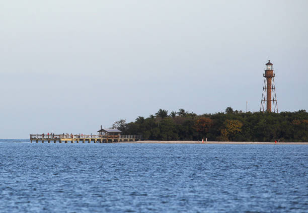 istock Pier and Lighthouse on Sanibel Island Pre-Ian 1441734148