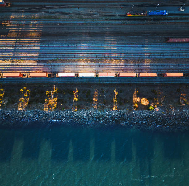 Looking down on a railyard in evening sunlight.