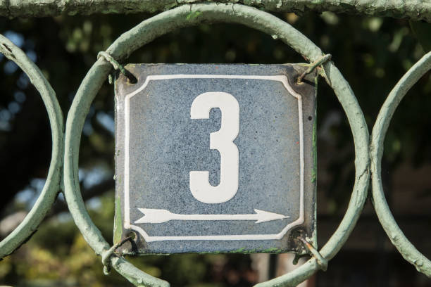 istock Weathered enameled plate number 3 1441744473
