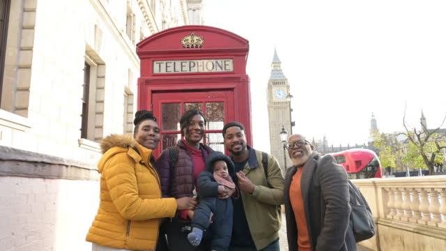 Portrait of Black family enjoying London in autumn