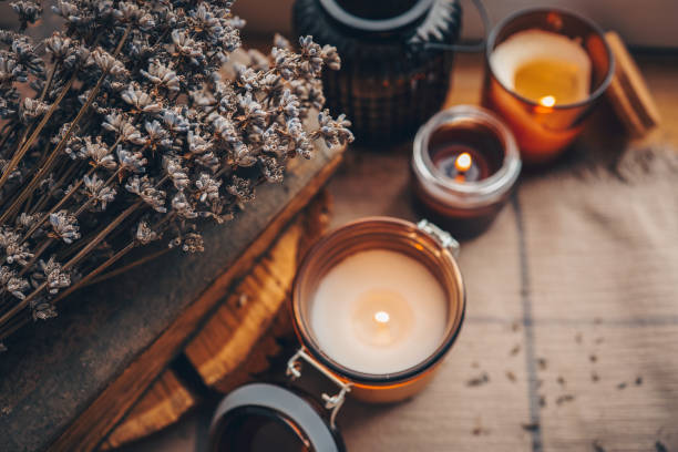 istock Lavender and candles on a old wooden background 1441751281