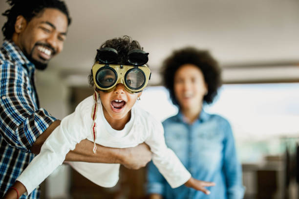 istock Wee daddy, I'm flying like an airplane! 1441751502