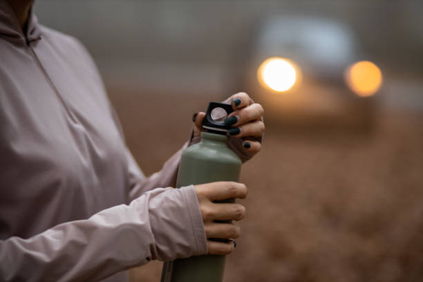 istock Female athlete holding an eco bottle 1441751836