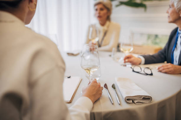 istock Business people in restaurant 1441754095