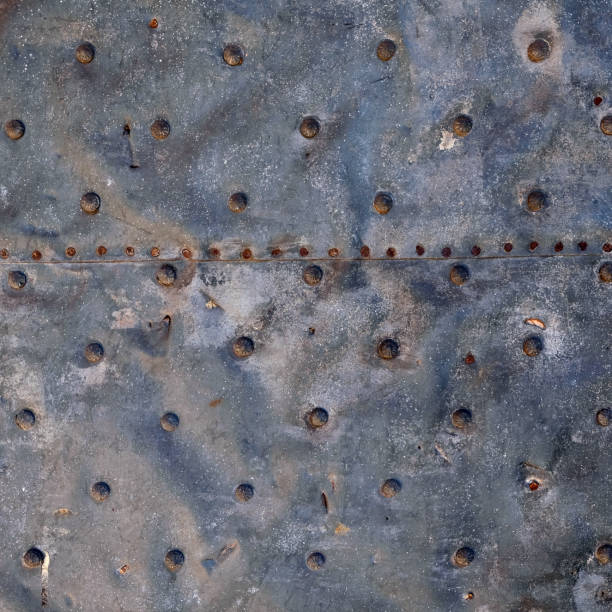 istock Old metal plate. For use as a background or texture. 1441756045