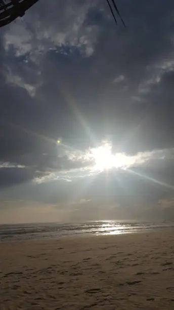 Photo of to watch the morning sun clouded by the beach