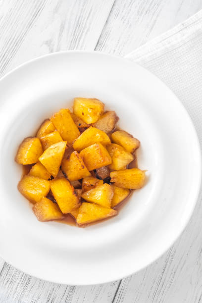istock Slices of roasted pineapple 1441756488