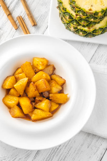 istock Slices of roasted pineapple 1441756530