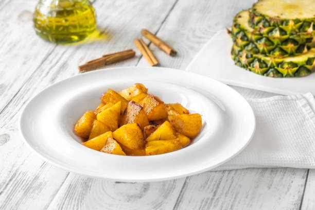 istock Slices of roasted pineapple 1441756568