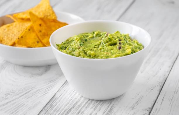 istock Guacamole with tortilla chips 1441756693