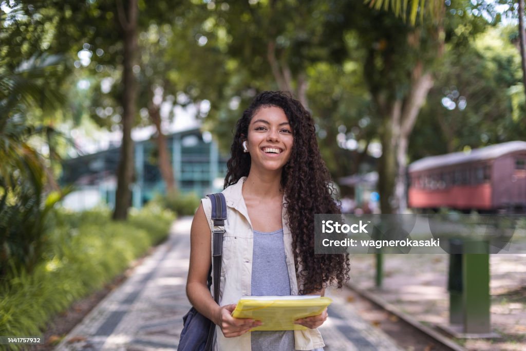 Outdoor portrait of a female university student University Student Stock Photo