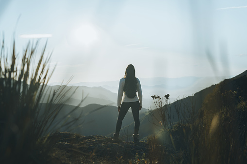 Woman on top of the mountain