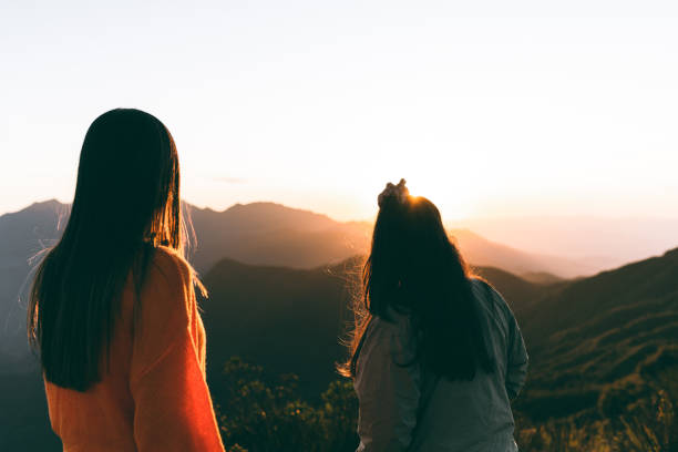 istock Women at sunset in the mountains 1441762973