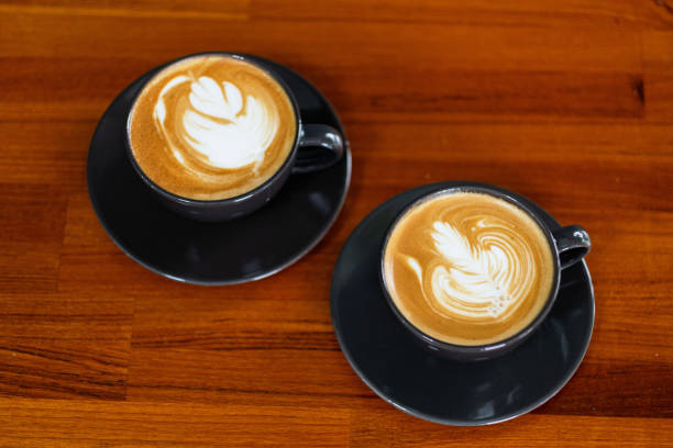 istock hot latte art coffee on wood table, relax time 1441766274