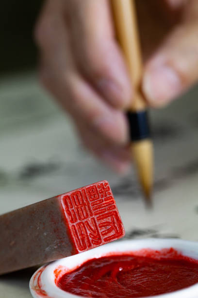 istock Practicing Chinese calligraphy, the traditional art of hand writing 1441768151