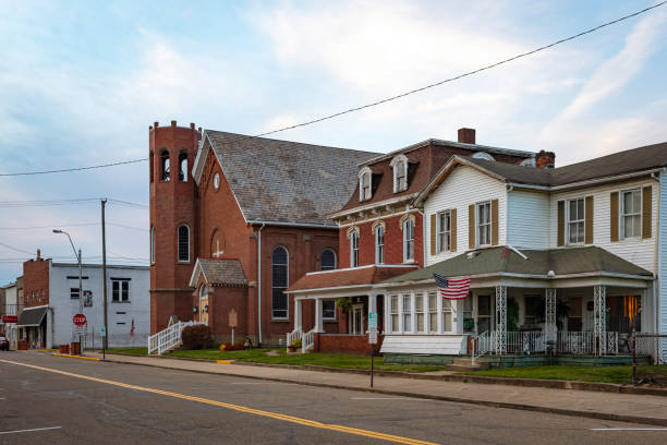 Dennison, Ohio, USA- Oct. 24, 2022: View looking at the historic buildings including the Railway Chapel on Grant Street in the historic district of Dennison at dusk.