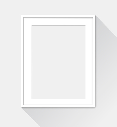 vertical photo frame on plain wall background