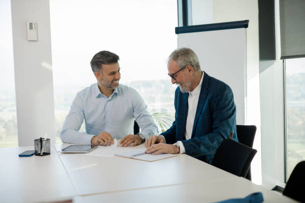 istock Office colleagues having casual discussion 1441771650