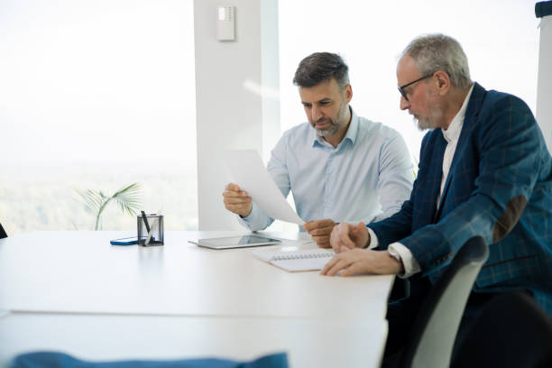 istock Businesspeople having a briefing 1441771653