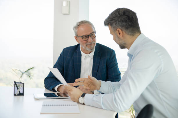 istock Businesspeople having a briefing 1441771667