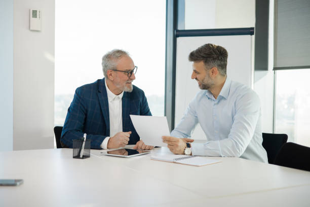 istock Office colleagues having casual discussion 1441771669
