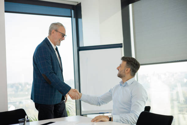 istock Office colleagues having casual discussion 1441771672