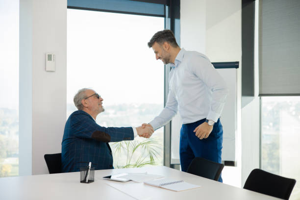 istock Office colleagues having casual discussion 1441771675