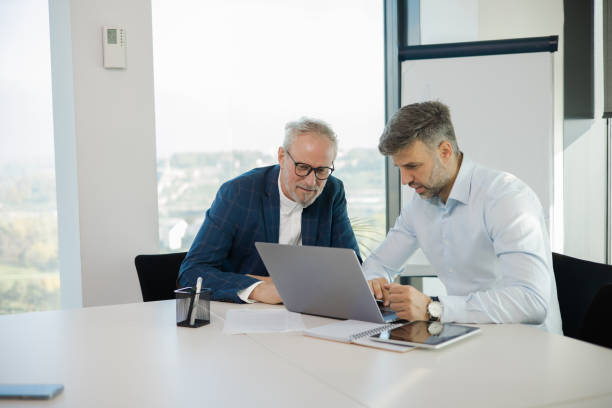 istock Office colleagues having casual discussion 1441771683