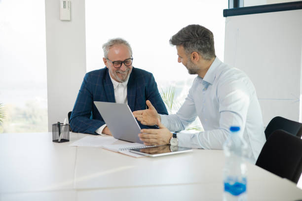 istock Office colleagues having casual discussion 1441771688