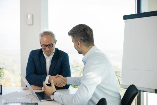 istock Office colleagues having casual discussion 1441771701