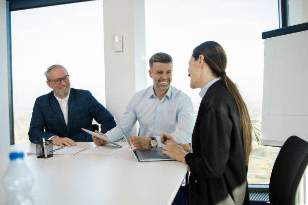 istock Office colleagues having casual discussion 1441771709