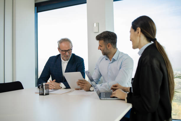 istock Office colleagues having casual discussion 1441771715