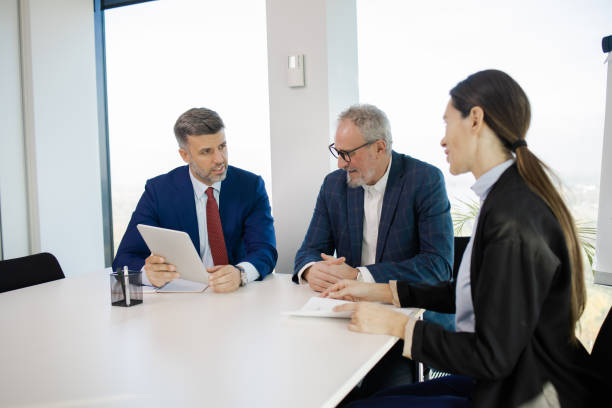 istock Businesspeople having a briefing 1441771729