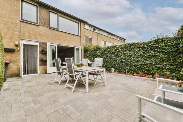 istock Courtyard with tiled floor and small recreation area 1441783111