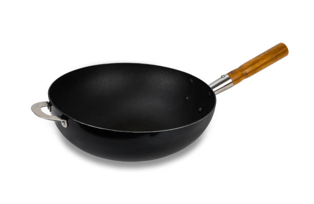 istock Cast iron pan with wooden handle isolated on white background with clipping path. 1441785067