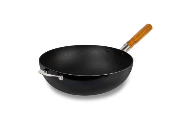 istock Cast iron pan with wooden handle isolated on white background with clipping path. 1441785102