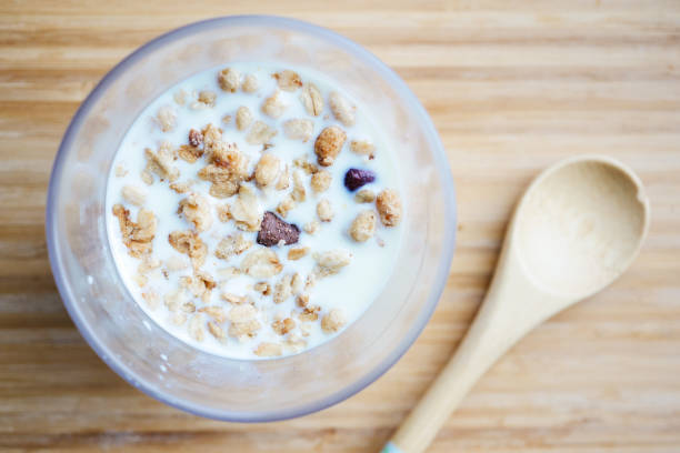 istock breakfast cereal and milk in a glass on table 1441798668