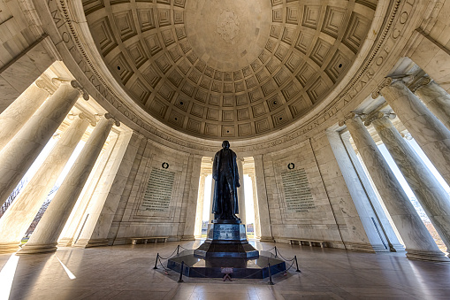 Thomas Jefferson stands silently in the Jefferson Memorial, Washington, CD