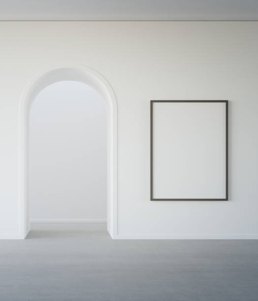 istock Empty white blank picture frame on concrete wall and arched door in modern house or luxury hotel. 1441808383