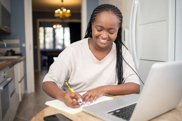 istock Young woman working from home 1441809391
