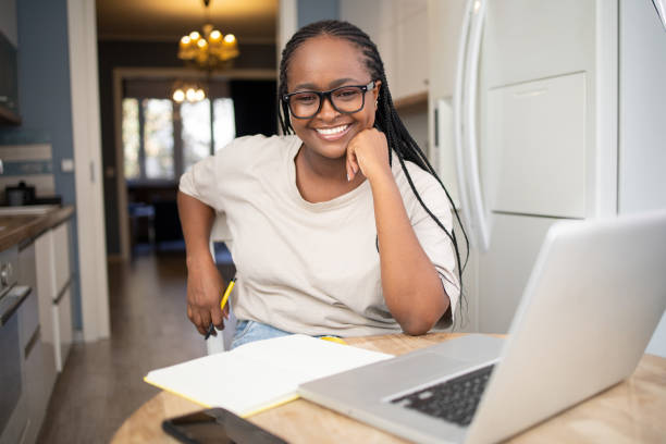 istock Young woman working from home 1441809421