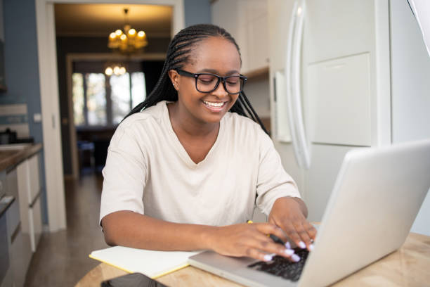istock Young woman working from home 1441809427