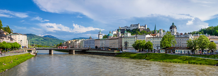 Salzburg, Austria - May 1, 2012: Panorama of Salzburg Old Town and Hohensalzburg Castle on Festungsberg hill over Salzach river. Salzburg Altstadt is internationally renowned for baroque architecture