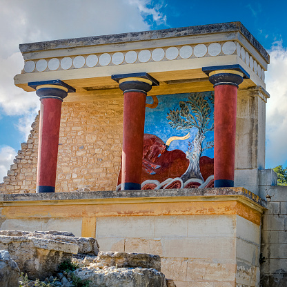 Knossos palace. Crete, Greece. Knossos palace - largest Bronze Age archaeological site on Crete of the Minoan civilization and culture. Beautiful frescoes were discovered on the site, showing us the nature of the society of the earliest Cretans.