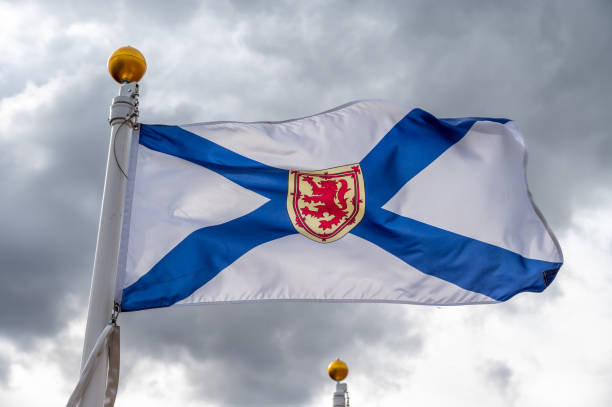 Flag of Nova Scotia waiving on a cloudy Canadian day.