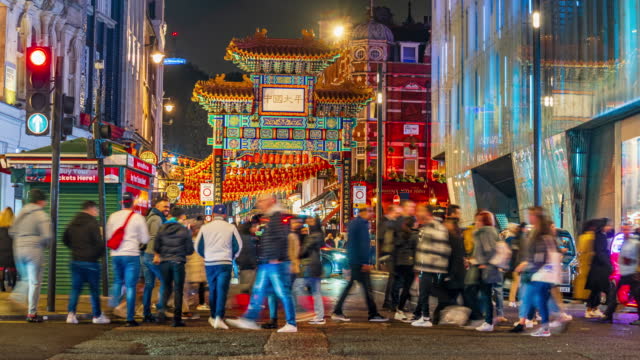 Time lapse of Crowded People and Tourist walking and sightseeing at London Chinatown