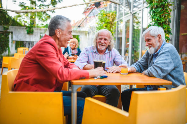 istock Attractive Aged Men Having a Drink Together 1441815722