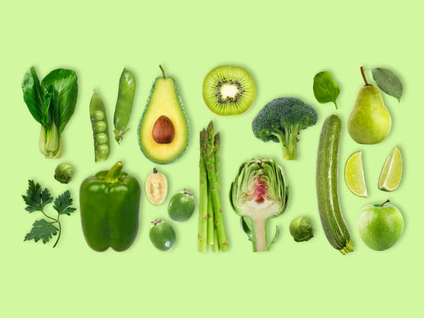 istock Creative layout made of different green fruit and vegetables. 1441820274
